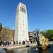 Masters level and PHD students file past the Burton Memorial Tower as they walk over to Hill Auditorium for commencement on Friday morning. Melanie Maxwell I AnnArbor.com